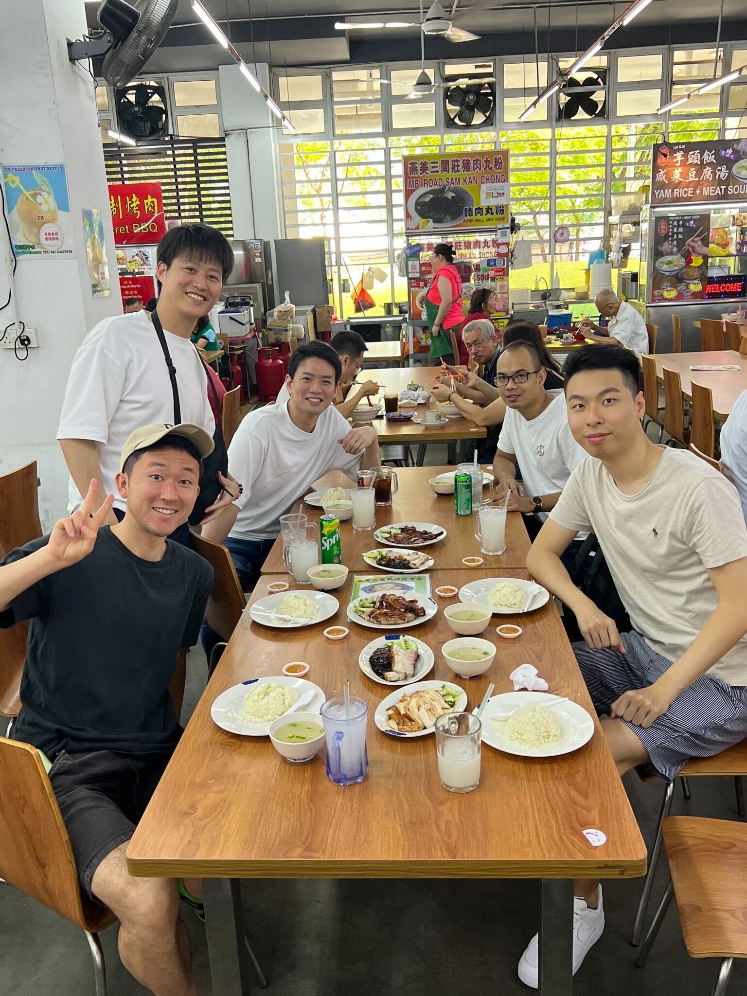 Group photo during chicken rice meal